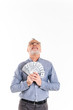 © Drobot Dean - Happy man holding dollars and looking up isolated