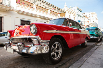 Wall Mural - Cuba, Havana: American classic car parked on the street