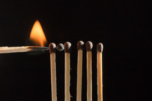 Burning Matches Isolated On Black Background