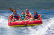 Family water sport adventure on the sea