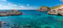 Panoramic View Of Crystalline Turquoise Waters Of Cala S'Almunia Beach From Cap Des Moro. Located In Santanyi, Majorca, Balearic Islands, Spain.