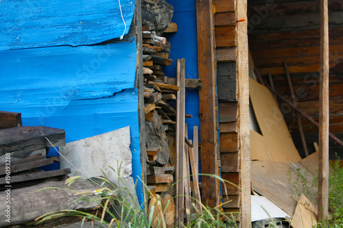 Old Barn With Wood Firewood Abandoned Building With Garbage