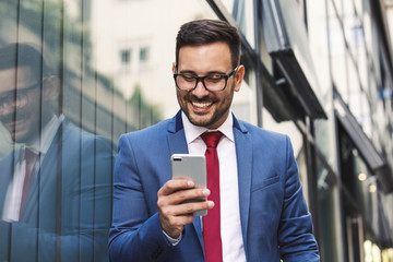 Wall Mural - Businessman using phone