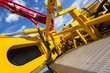 © antonmatveev - Concrete pump of construction machine, heavy industry abstraction, blue sky and white clouds on background