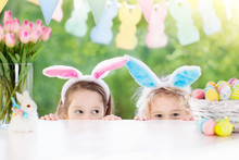Kids With Bunny Ears And Eggs On Easter Egg Hunt.