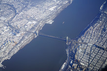 Aerial View Of The George Washington Bridge Over The Hudson River Between New York And New Jersey After A Winter Snow Storm In New York City