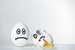 © 5second - Eggs with funny faces on grey background