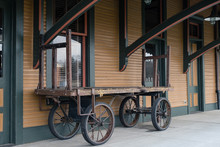 Old Train Luggage And Cargo Cart At Train Station