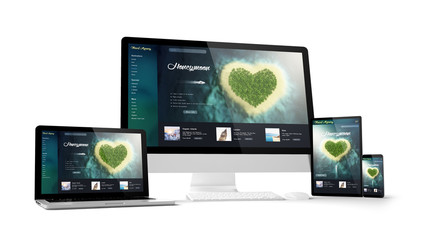 computer gadgets with travel website on screen