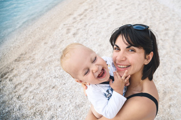 Sticker - Woman Holding Laughing Baby