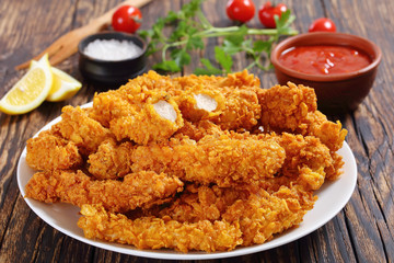 Canvas Print - close-up of crispy fried chicken breast