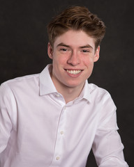 Canvas Print - Portrait of smiling young man