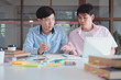 © ijeab - Young students campus helps friend catching up and learning.