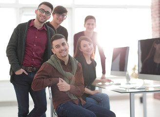 Poster - portrait of friendly business team in office.