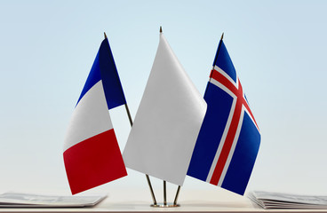 Flags of France and Iceland with a white flag in the middle