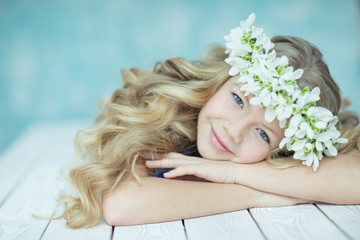 Wall Mural - Fashionable girl with a wreath of flowers 