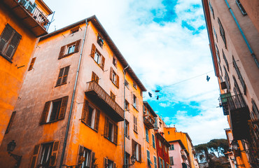 some ancient houses with orange facades