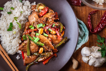 Wall Mural - Kung Pao chicken with peppers and vegetables