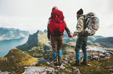couple backpackers holding hands enjoying mountains view family traveling together adventure lifesty