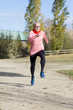 © 2Design - Senior man wearing glasses jogging at the park