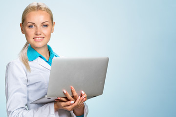 Wall Mural - Smiling medical woman doctor