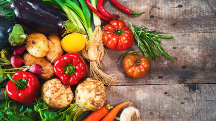 Wall Mural - Organic vegetables healthy nutrition concept on wooden background