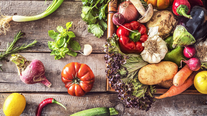 Organic vegetables healthy nutrition concept on wooden background