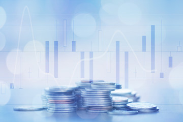 Double exposure Rows of coins of Graph on the table,finance and business concept,Money,soft focus and blurred style,dark tone.