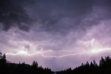 Lightning In Sky Over Canadian Rocky Mountains, Kootenay Region, Fernie, British Columbia, Canada