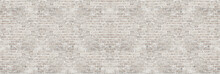 Vintage White Wash Brick Wall Texture For Design. Panoramic Background For Your Text Or Image.