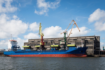 Cranes and ships in a cargo port