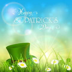 Wall Mural - Patricks Day and green hat of leprechaun in grass on sky background