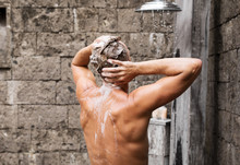 Man Taking Shower And Washing Hair