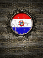 Old   Paraguay flag in brick wall