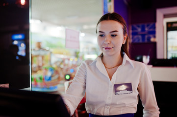 Waiter girl working with pos terminal or cashbox at cafe. People and service concept