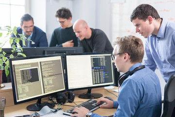 Wall Mural - startup business and entrepreneurship problem solving. young ai programmers and it software develope