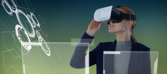 Wall Mural - Composite image of young businesswoman wearing vr glasses