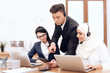 © freeograph - An Arab woman works in a call center.