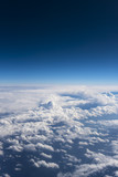 Fototapeta  - Beautiful view from window of airplane in blue sky