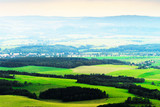 Fototapeta Pokój dzieciecy - Misty valley of  Broumovsko in Czech Republic with fields and green meadows. Scenic picturesque countryside landscape. Rural scenery aerial view.