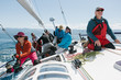 © Mihael Blikshteyn Photography/Stocksy - Crew on a racing sailboat or yacht