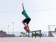 © ACALU Studio/Stocksy - Young balancing on a skateboard in skate park