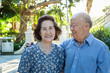 © aremafoto/Stocksy - Happy Senior Asian Couple in a Park