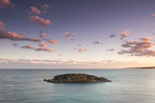 Islet In Mediterranean Sea At Sunset