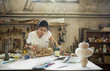 © Jelena Jojic Tomic/Stocksy - Furniture designer at her workshop