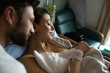 © Rob and Julia Campbell/Stocksy - Brand new mother, father and child after delivery in hospital room