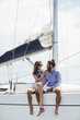 © Lumina/Stocksy - Couple Enjoying Summertime on Sailing Boat