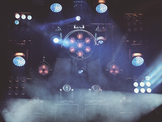 stage lights during a music concer or festival with smoke