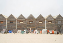 View Of Beach Huts On The Seashore