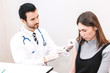 © Art_Photo - Doctor in protective gloves giving a female patient injection  in hospital.healthcare and medicine